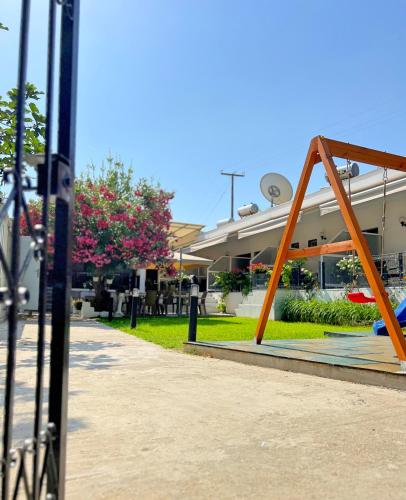 a metal frame in front of a building at Guest House Julia in Stavros
