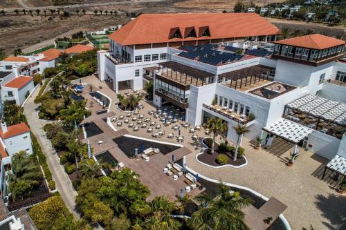 an aerial view of a large white building with a red roof at Fuerteventura Princess in Playa Jandia