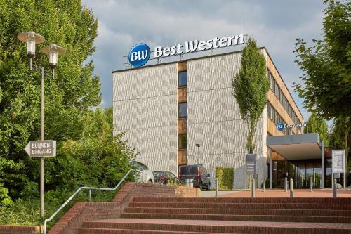 a building with a blue best western sign on it at Best Western Hotel Bochum in Bochum