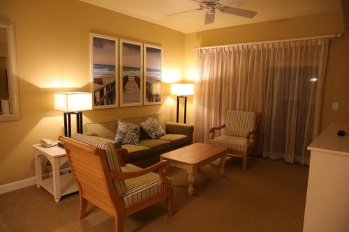 a living room with a couch and a table at Unit at the Sheraton Broadway Plantation in Myrtle Beach