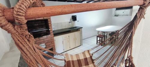 a view of a kitchen with a table at Casa Mineira in Capitólio
