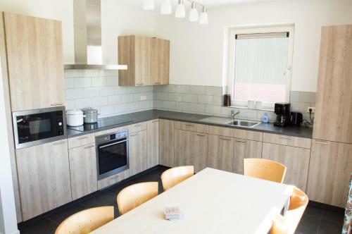A cozinha ou cozinha compacta de Cornelly Vakantiewoningen