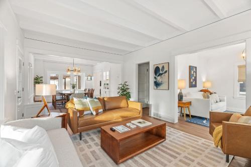 a living room with a couch and a table at Featherstone in White Bear Lake