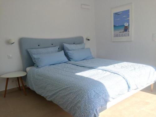 Llit o llits en una habitació de Villa Olympia