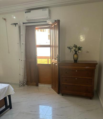 Tempat tidur dalam kamar di Residence Maria