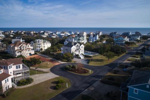 an aerial view of a residential neighborhood with houses at 4052 - Mirth N Mist II in Duck