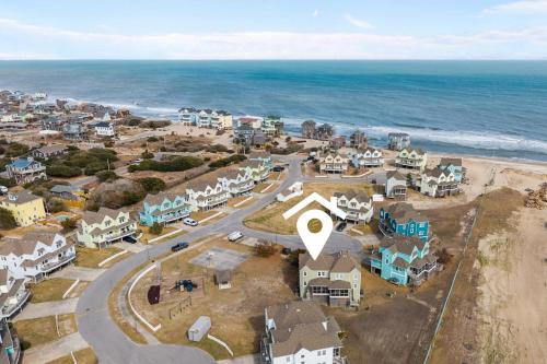 an aerial view of a small town next to the ocean at 7767 - Swordfish in Buxton
