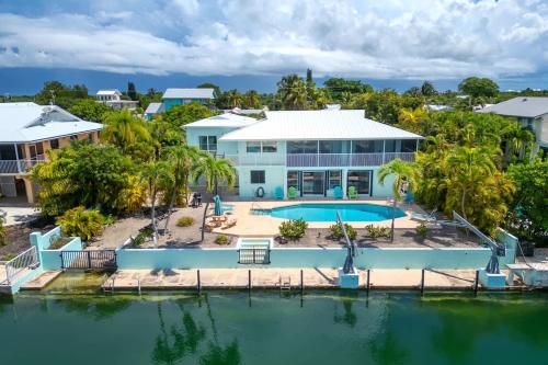 an aerial view of a house with a swimming pool at Reel Caribbean Getaway in Summerland Key