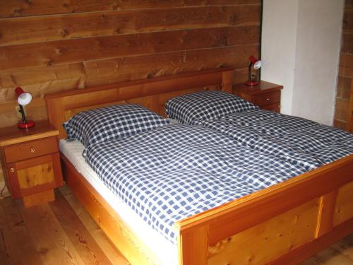Postel nebo postele na pokoji v ubytování Almhütte Adlerhorst