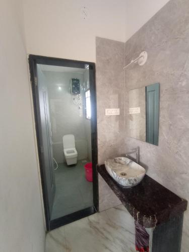 Gallery image of Dhanalaxmi Yatri Nivas in Kolhapur