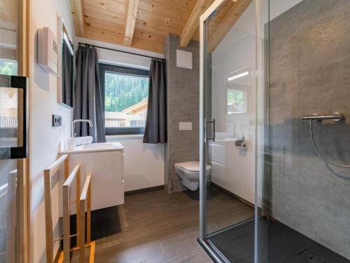 a bathroom with a shower and a toilet at Obermöschach 7A in Obermöschach