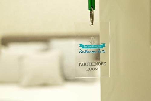 a sign on a door that reads bathroom while patriarchy rage room at Parthenope Suite in Naples