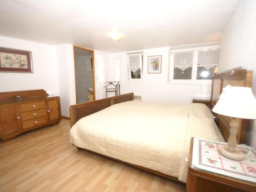 Cama o camas de una habitación en Vintage Apartment in Riquewihr with Terrace