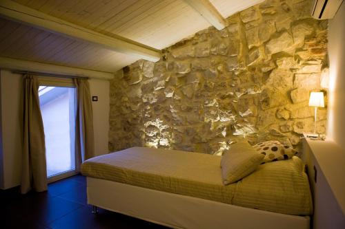 En eller flere senge i et værelse på A Mo Casa