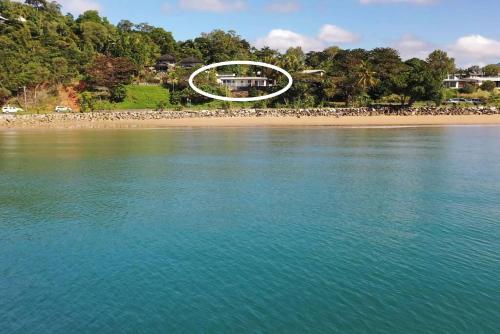 an aerial view of a house on a beach at Tide Pool Ocean Front 2 bed in South Mission Beach