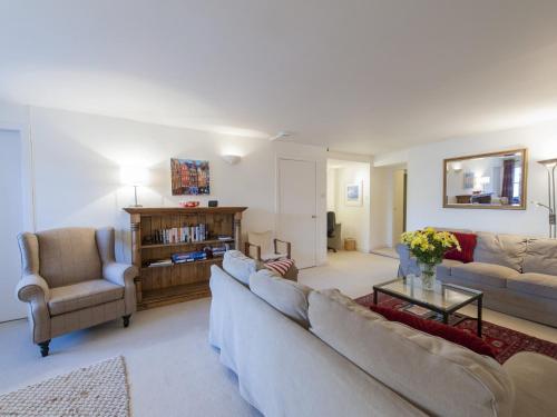 a living room with two couches and a table at 7A - Uk7350 in Edinburgh