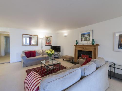 a living room with a couch and a fireplace at 7A - Uk7350 in Edinburgh