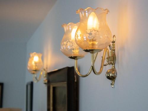 a pair of lights hanging on a wall at Marble Lodge - Uk7635 in Pitlochry