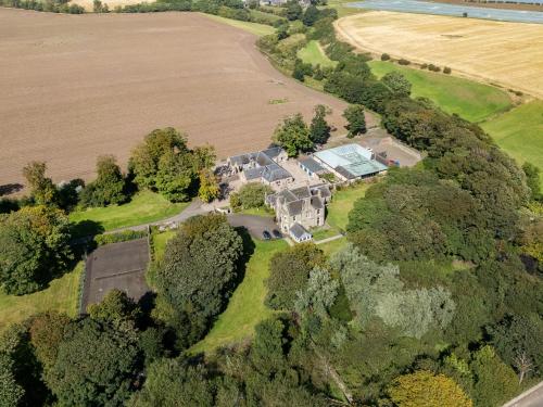 an aerial view of a house on a hill with a field at The Servant's Hall - Ukc6964 in Carnoustie