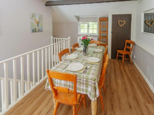 a dining room with a table and chairs at Number Three - Ukc4965 in Tawstock