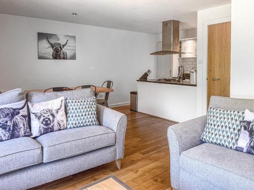 a living room with a couch and a chair at Raven Wing 17 - Ukc4882 in Fort Augustus