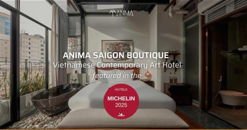 a room with a white couch in a room with a window at ANIMA Vietnamese Contemporary Art Boutique Hotel in Ho Chi Minh City