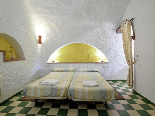 Cama o camas de una habitación en Belvilla by OYO Cueva 2 dorm