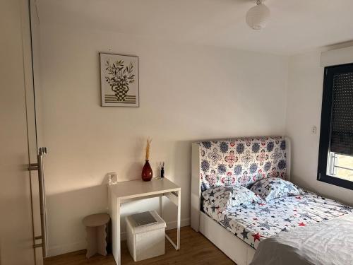 Llit o llits en una habitació de Asnières