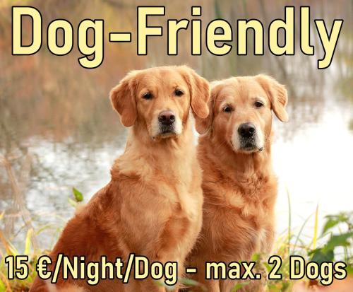 two dogs sitting next to each other with the words dog friendly at Chalet Saneberg am Hochgrat - Oberstaufen PLUS Card - Dogfriendly in Oberstaufen