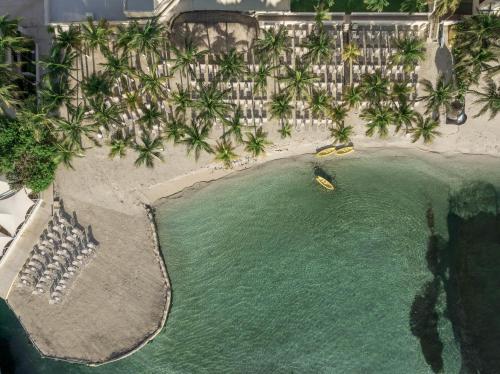 an aerial view of a small island in the ocean at Occidental Costa Cancún - All Inclusive in Cancún