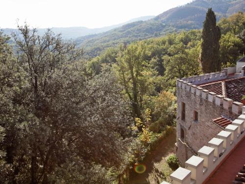a view from the side of a building with trees at Chianti Romantic Retreat in Lucolena in Chianti
