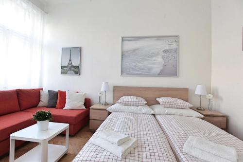 Postel nebo postele na pokoji v ubytování Angel City Aparthotel