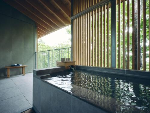 a pool of water in a room with at SANU 2nd Home Nasu 3rd in Nasu