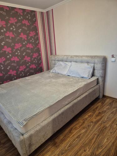 Postel nebo postele na pokoji v ubytování Apartament confortabil