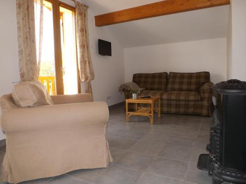 Χώρος καθιστικού στο Le chalet d'Heidi