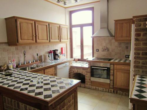 Kuchyň nebo kuchyňský kout v ubytování Holiday home in Cul des Sarts