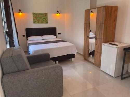 Llit o llits en una habitació de Imbrossa Hotel