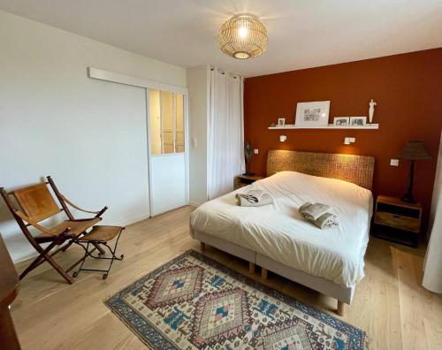 Llit o llits en una habitació de AppartCosy 10