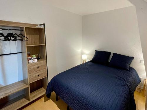 Llit o llits en una habitació de EasyHome 23