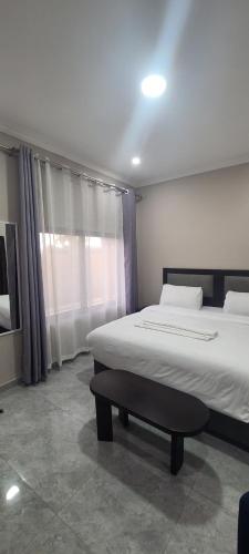 Кровать или кровати в номере Ferngrove lodge