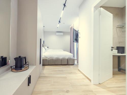 Postel nebo postele na pokoji v ubytování Enigma Rooms
