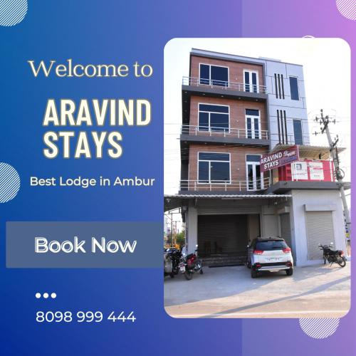 a sign that reads welcome to annual stays best lodge in amuri at Aravind Stays in Āmbūr