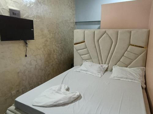 Llit o llits en una habitació de Complexe Yveleo Confort