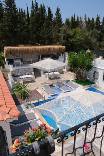 a view of a resort with a swimming pool at Alacati Naz Konak in Çeşme