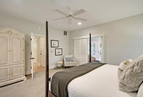 a bedroom with a bed and a ceiling fan at 13 Angler Hall in Kiawah Island