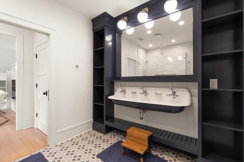 a bathroom with a sink and a mirror at 3 Surfsong in Kiawah Island