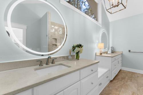 a bathroom with a sink and a mirror at 2455 The Bent Twig in Seabrook Island