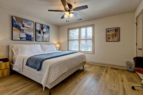 a bedroom with a bed and a ceiling fan at Alpine Retreat in Helen