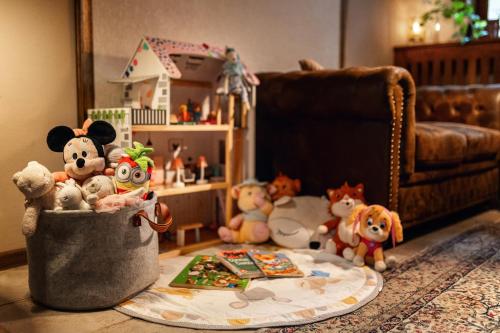 a group of stuffed animals in a living room at City Residence Apartment Hotel in Košice