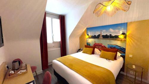 a bedroom with a bed with a painting on the wall at Best Western Le Vinci Loire Valley in Amboise
